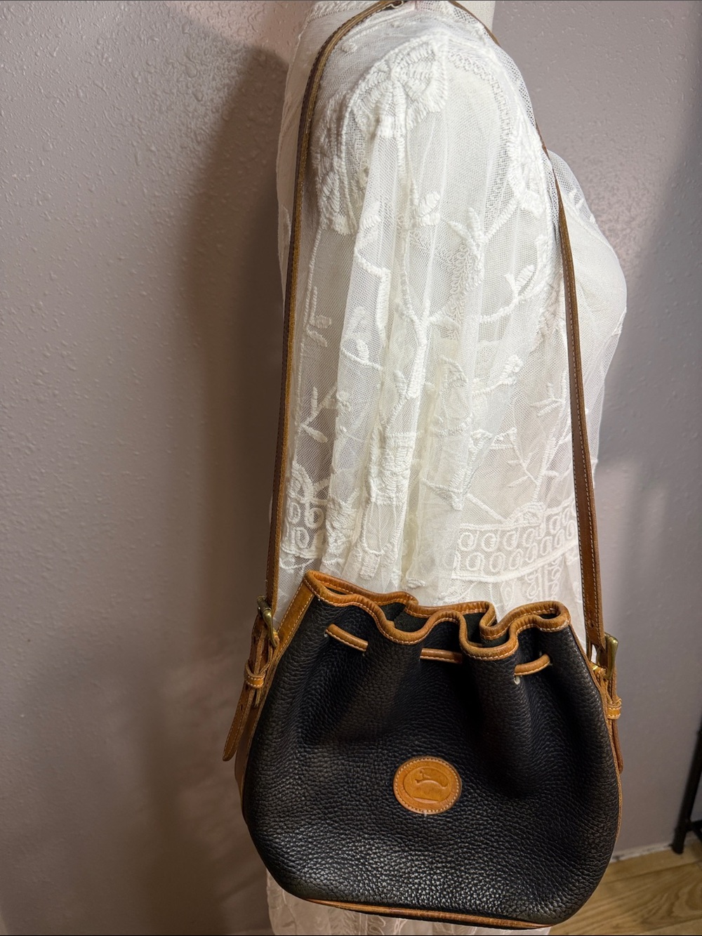 Dooney Bourke Black and Tan Leather Drawstring Shoulder Bag